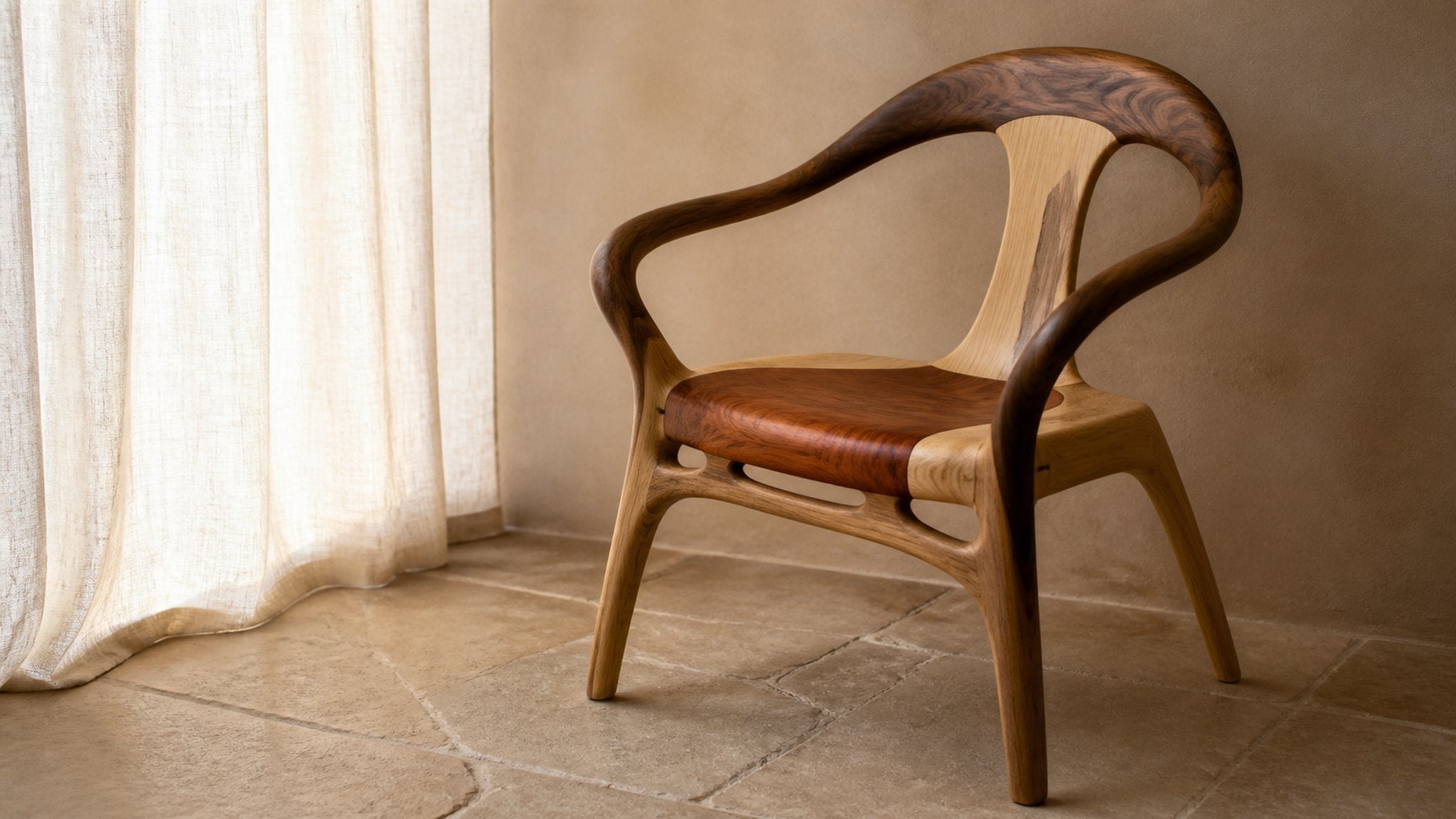 Natural-wood chair with clean joinery beside a plain plaster wall