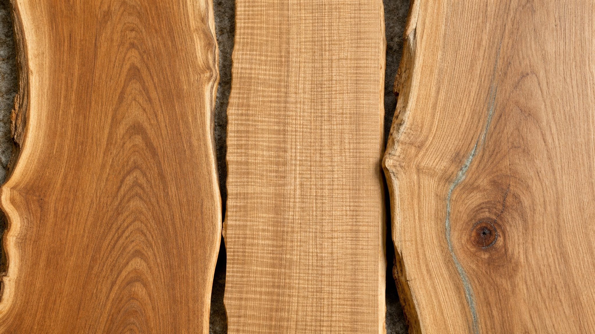 Three natural-wood boards showing different grain figure side by side